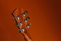 six-string acoustic guitar on a red background Royalty Free Stock Photo
