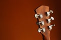 six-string acoustic guitar on a red background Royalty Free Stock Photo
