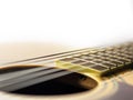 Six - string acoustic guitar on a white background. Royalty Free Stock Photo