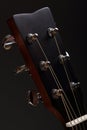 Six-stringed acoustic guitar head with tuning pegs Royalty Free Stock Photo