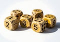 Six vintage, cracked dice with numbers 1 through 6 on a white background Royalty Free Stock Photo