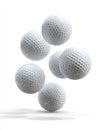 Six White Golf Balls Arranged Dynamically Against a Soft White Background with Subtle Shadows Royalty Free Stock Photo
