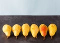 Six whole yellow pears Royalty Free Stock Photo