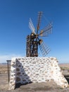Six wing rectangular female windmill on the Canary Island. Royalty Free Stock Photo