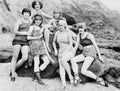 Six women posing at the beach Royalty Free Stock Photo