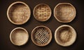 Six woven bamboo baskets of various sizes and weaving styles arranged in a row on a brown background Royalty Free Stock Photo