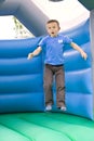 Six year old boy bouncing