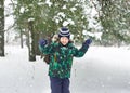 The six-year-old boy costs under a snow shower Royalty Free Stock Photo