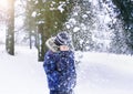 The six-year-old boy costs under a snow shower Royalty Free Stock Photo