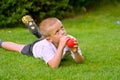 Six year old boy holding a balloon Royalty Free Stock Photo