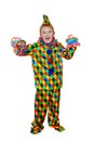 Six year old funny cute dancing boy in the clown suit. Without wig and makeup. Isolated, on white background Royalty Free Stock Photo