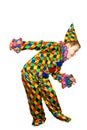 Six year old funny cute dancing boy in the clown suit. Without wig and makeup. Royalty Free Stock Photo