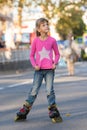 Six-year-old girl roller skating Royalty Free Stock Photo