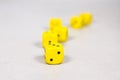 Six Yellow Dice Randomly Placed On  Clean Clear White Gray Grey Slated Background Royalty Free Stock Photo