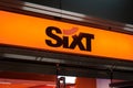 Sixt logo on store front. Sixt is a car rental company