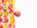 Sixteen suncrisp apples arranged in a pattern on a white background, shot from above, with copy space