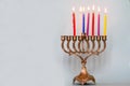 Sixth day of Hanukkah with burning Hanukkah colorful candles in Menorah.Chanukkah-jewish holiday. Royalty Free Stock Photo