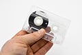 Sixty minute transparent old compact audio cassette tape,  on white background Royalty Free Stock Photo