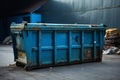 The sizeable blue dumpster, a robust iron container built for waste transportation