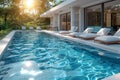Large Swimming Pool With Chaise Lounges