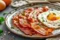 Sizzling Bacon and Sunny Side Up Egg on a Plate