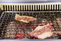 Sizzling beef slices grill on charcoal, Korean or Japanese BBQ style cuisine