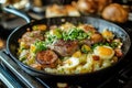 A sizzling skillet of bubble and squeak with braised goose. Royalty Free Stock Photo