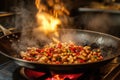 A sizzling wok of kung pao chicken with peanuts and chilies. Royalty Free Stock Photo