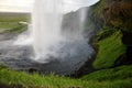 SkÃ³gafoss waterfall, Iceland, Europe. View of the SkÃ³gafoss waterfall with green background. Royalty Free Stock Photo