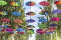 Skadovsk, Ukraine - June 23, 2017: Colorful umbrellas hanging on the main avenue of the city