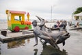 Skadovsk, Ukraine - June 20, 2017: Monument on the water: children with dolphin, waterfront, set