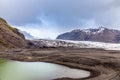 Skaftafellsjokull glacier with mountains and green lake in front, Vatnajokul national park, South Iceland Royalty Free Stock Photo