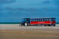 Skagen, Denmark, June 15, 2022: Tractor carrying tourists at Gre