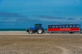 Skagen, Denmark, June 15, 2022: Tractor carrying tourists at Gre Royalty Free Stock Photo