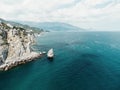 aerial photo of rock Parus Sail and Ayu-Dag Bear Mountain and near Gaspra, Yalta, Crimea at bright sunny day over Royalty Free Stock Photo