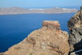 Skaros rock in Santorini against blue sea as a