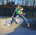 Skate park scooter boy Royalty Free Stock Photo