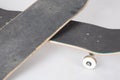 Skateboard black board in top view isolated on white background