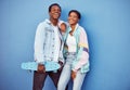 Skateboard, black couple and happiness portrait together for youth, gen z and summer motivation outdoor. African man