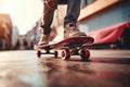 Skateboard, closeup pink skate wheel and foot or leg