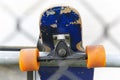 Skateboard detail and skater. Street urban background. Outdoor Royalty Free Stock Photo