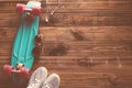 Skateboard flat lay on wooden floor