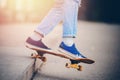 Skateboard man in shoes and jeans getting ready to jump kickflip olli from steps