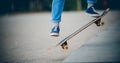 Skateboard man in shoes and jeans getting ready to jump kickflip olli from steps