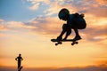 Skateboarder in action. Boy making skate air trick with grab Royalty Free Stock Photo