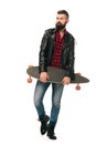 Skateboarder in black leather jacket posing with longboard isolated Royalty Free Stock Photo