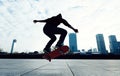 Skateboarder doing a trick named ollie