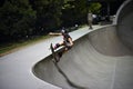 Skateboarder doing trick at skatepark