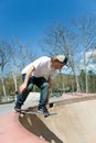 Skateboarder Falling Into the Bowl Royalty Free Stock Photo