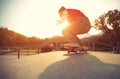 Skateboarder legs doing a track ollie